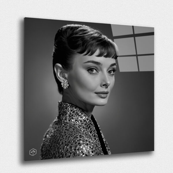 "a hyperrealistic black-and-white portrait of Audrey Hepburn in the classic Studio Harcourt style. This collection, ""Eternal Elegance: Timeless Portraits of Legendary Women,"" honors the legacy and influence of these extraordinary women, capturing their essence in the refined and timeless style of Studio Harcourt. These portraits celebrate their contributions to the world, ensuring that their memory and impact will endure for generations to come."