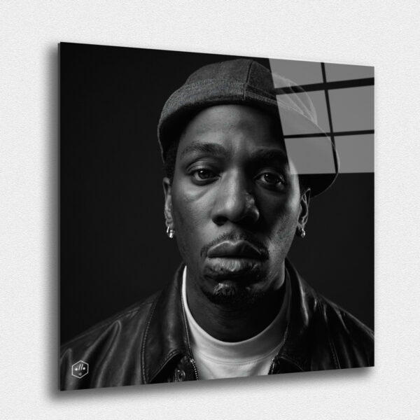 "A hyperrealistic black-and-white portrait of Big L in the sophisticated Studio Harcourt style. ""Legends Never Die: Timeless Portraits of Fallen Hip-Hop Icons in Harcourt Elegance"" captures the enduring spirit and cultural impact of the most iconic figures in hip-hop history. This exclusive collection presents each legendary artist in the timeless black-and-white style of Studio Harcourt, blending their powerful presence with classic elegance. The portraits pay tribute to the creativity, resilience, and influence of these fallen icons, immortalizing their legacy with unmatched sophistication. A must-have for collectors and fans alike, this series is a celebration of the enduring power of music, culture, and the voices that continue to inspire generations."