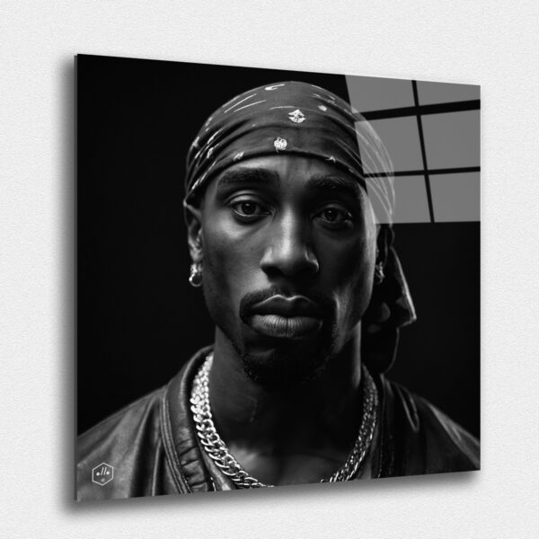 "A hyperrealistic black-and-white portrait of Tupac Shakur in the iconic Studio Harcourt style. ""Legends Never Die: Timeless Portraits of Fallen Hip-Hop Icons in Harcourt Elegance"" captures the enduring spirit and cultural impact of the most iconic figures in hip-hop history. This exclusive collection presents each legendary artist in the timeless black-and-white style of Studio Harcourt, blending their powerful presence with classic elegance. The portraits pay tribute to the creativity, resilience, and influence of these fallen icons, immortalizing their legacy with unmatched sophistication. A must-have for collectors and fans alike, this series is a celebration of the enduring power of music, culture, and the voices that continue to inspire generations."